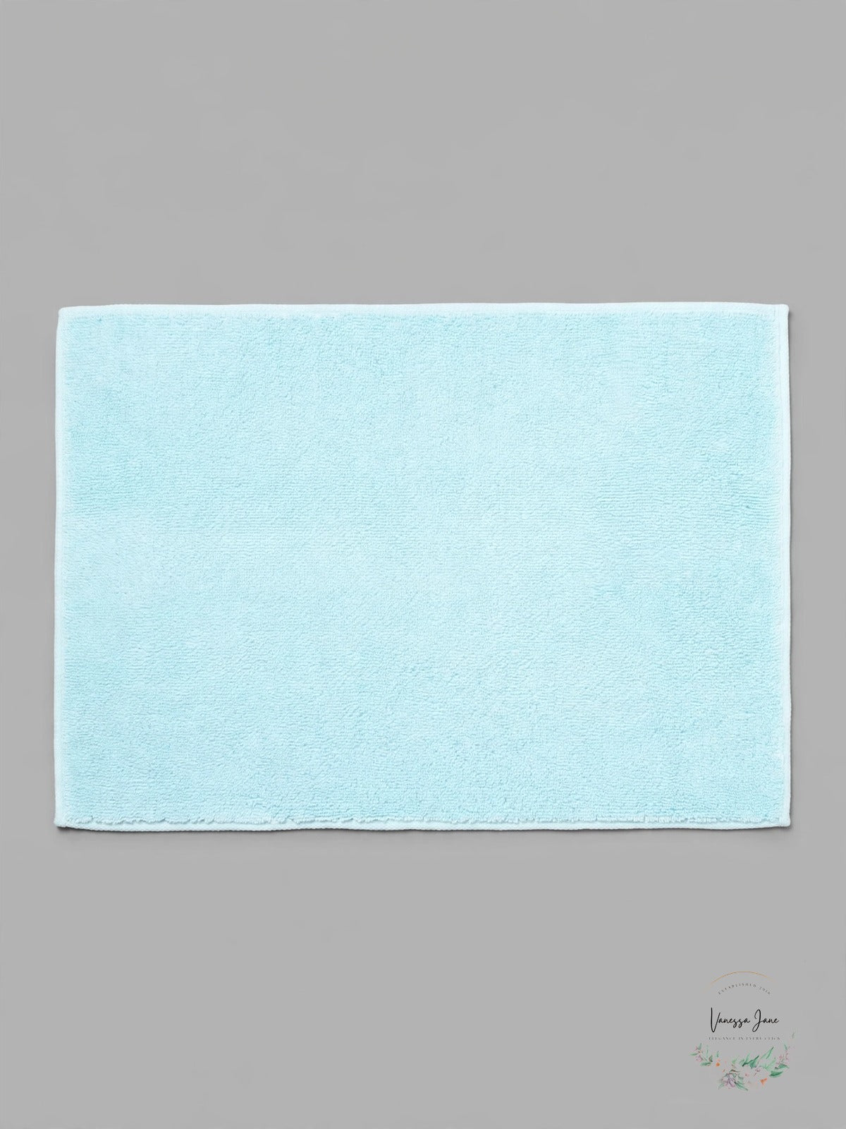 Hudson Park wan blue tub mat on gray