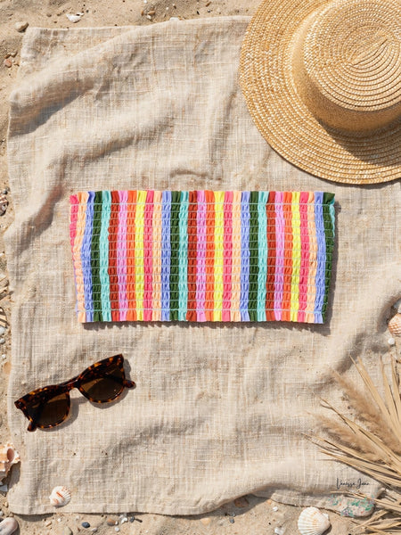 Salt + Cove Cabana Smocked Bandeau Bikini Top Multicolor Stripe - lifestyle beach flat lay