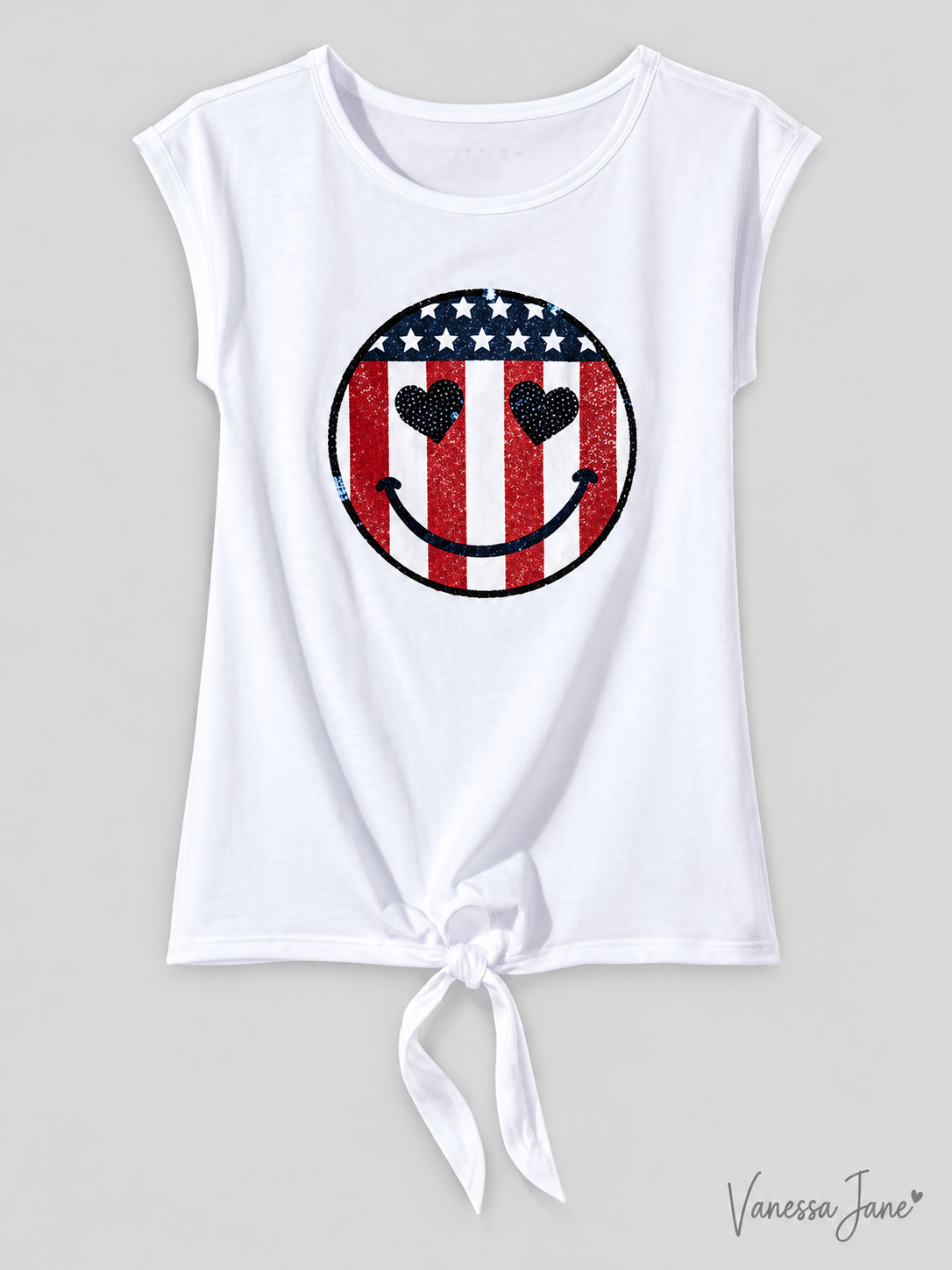 White girls top with red white and blue smiley graphic