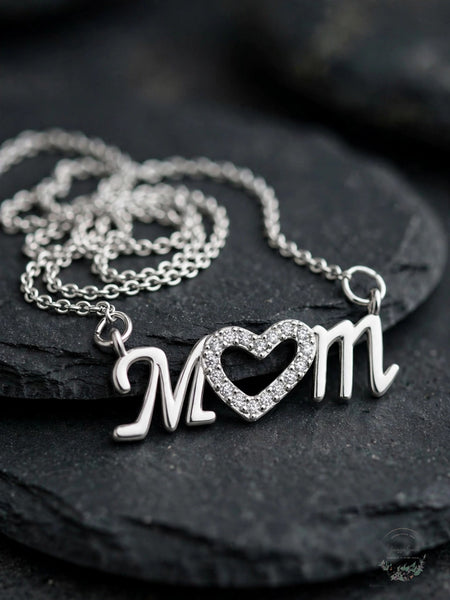Silver plated cubic zirconia pave Mom heart necklace stock photo
