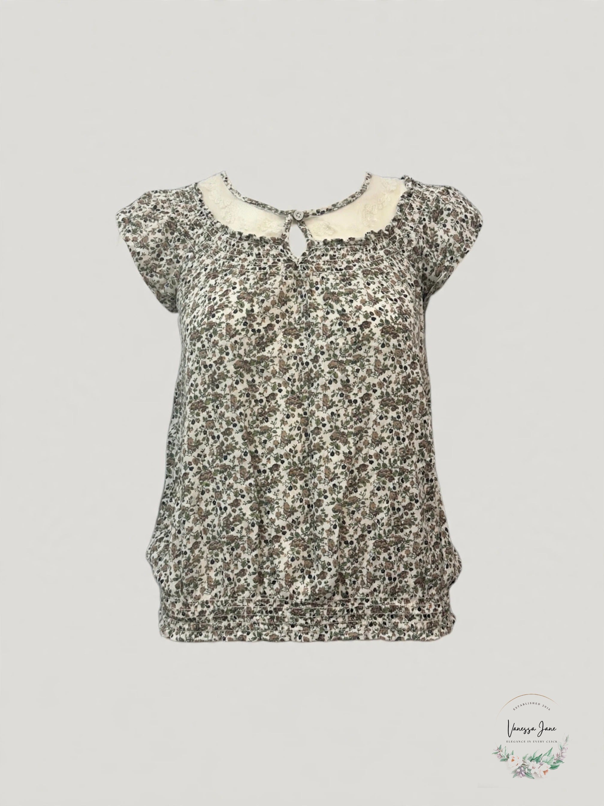 Nine West Mollie ivory floral lace yoke blouse stock photo