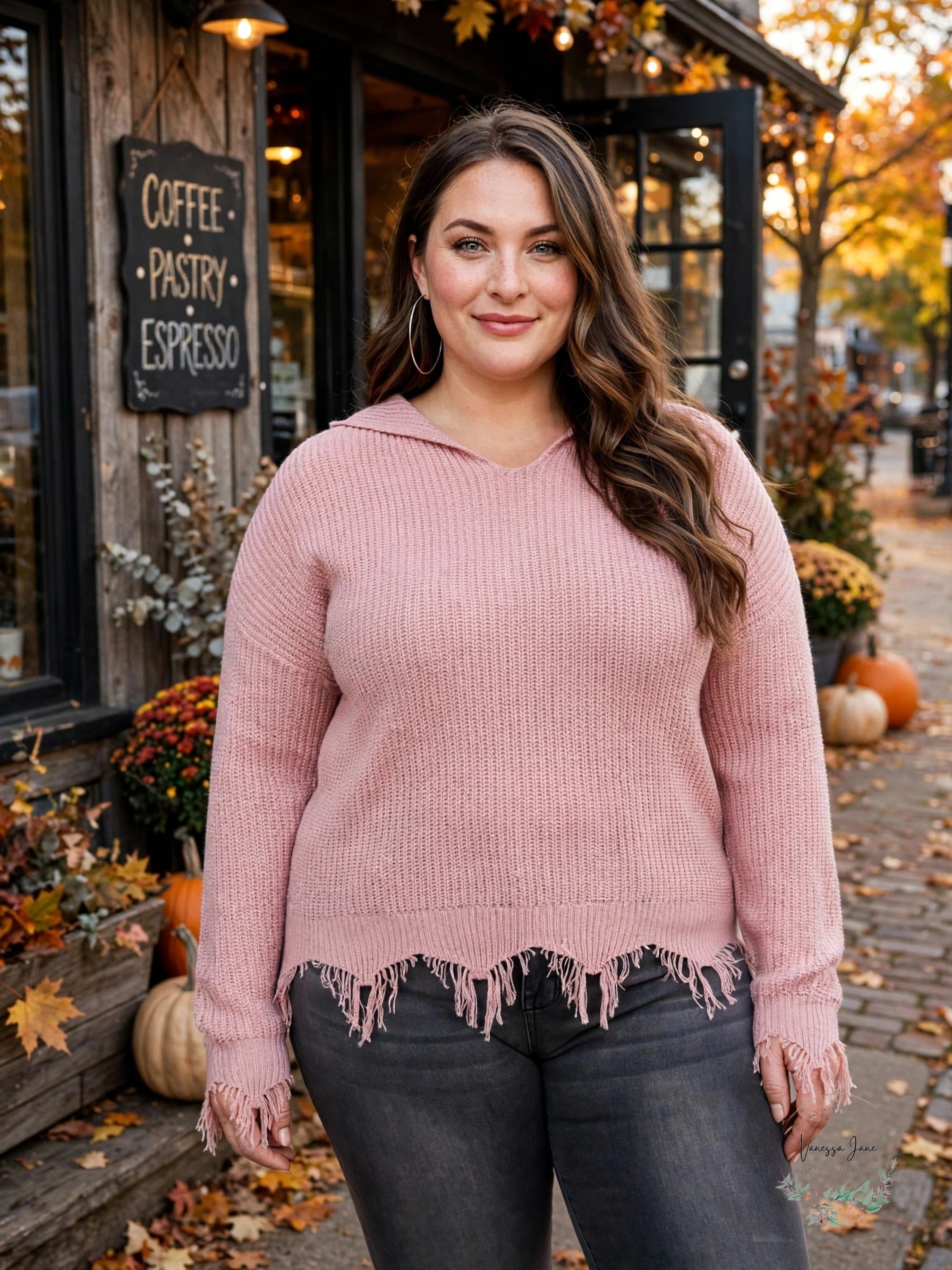 Pink hooded distressed sweater lifestyle photo