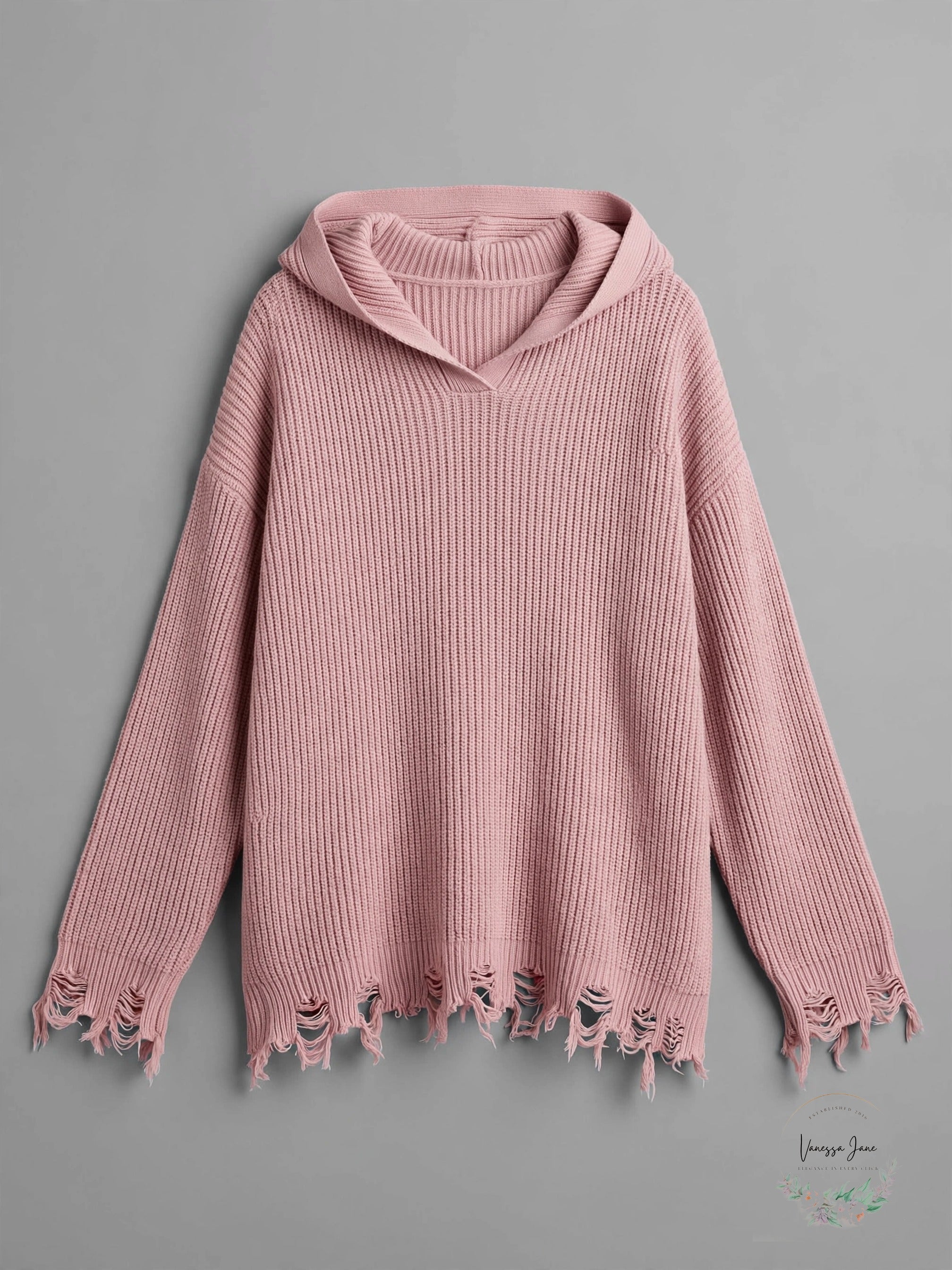 Pink hooded distressed sweater stock photo