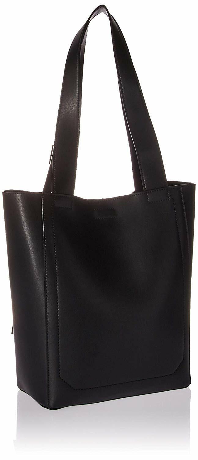 calvin klein karsyn leather backpack tote Calvin Klein Karsyn White Black Nappa Leather Stud Belted North/South – Vanessa Jane
