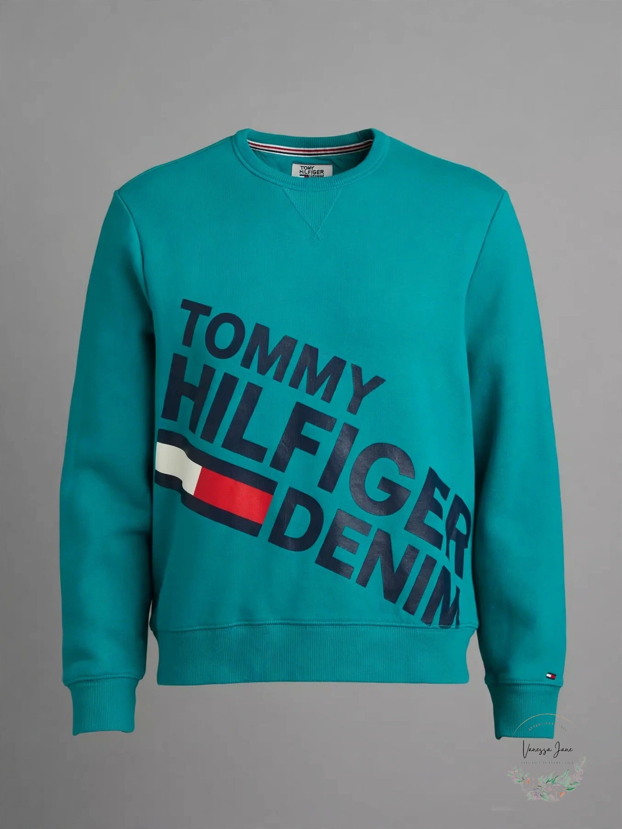 Tommy Hilfiger Denim graphic sweatshirt teal stock photo