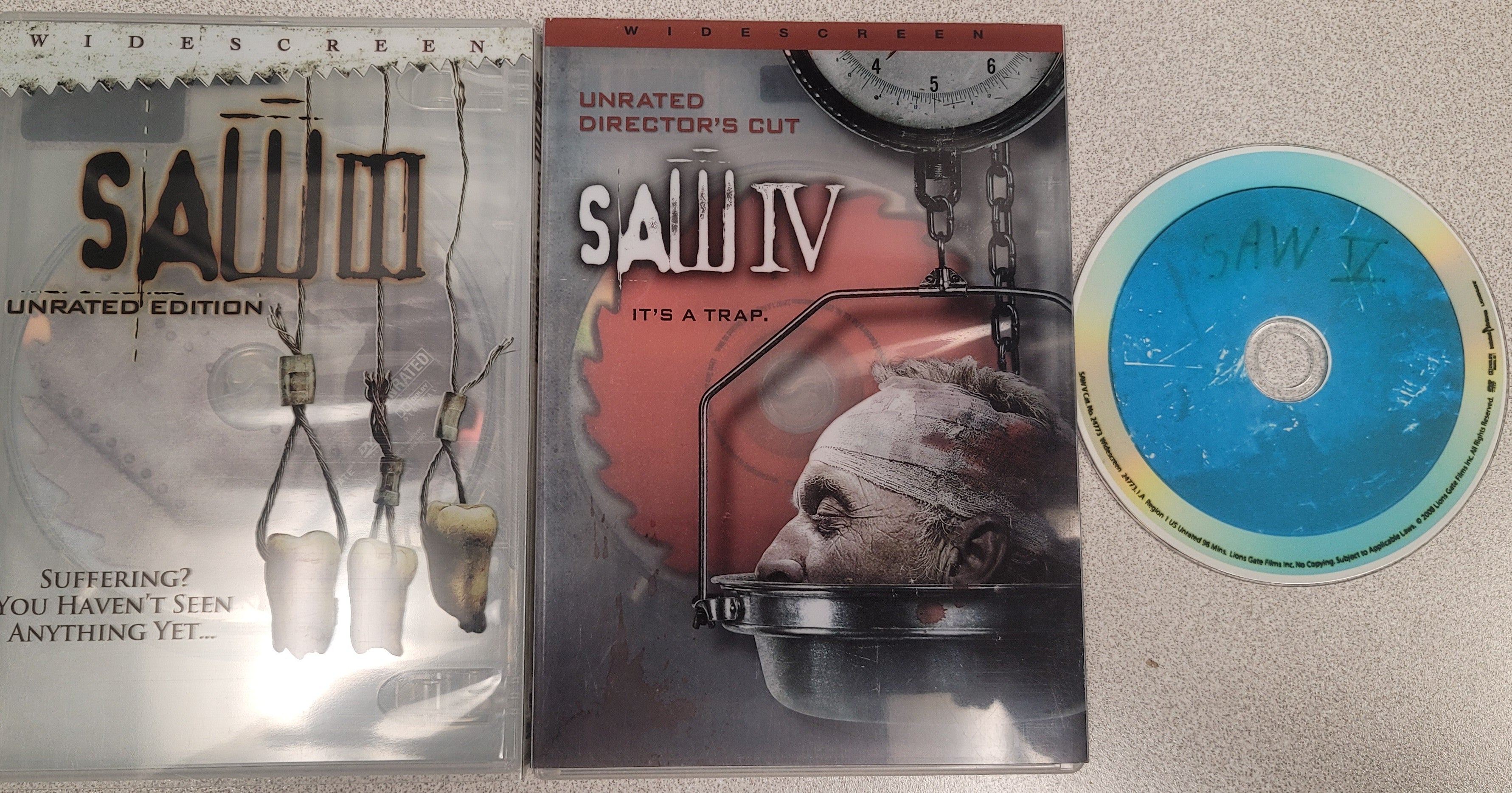 Saw DVD Triple Play: Saw III, Saw IV, Saw V