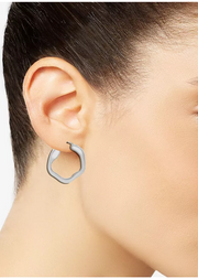 And Now This Silver Plated Wave Look Click Top Earrings
